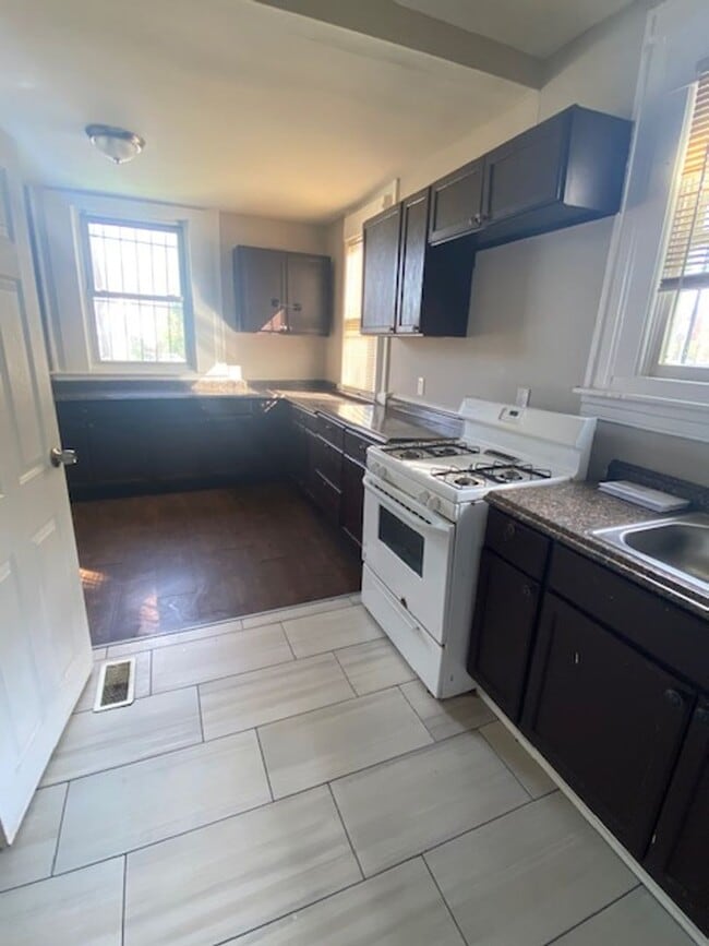 Photo - Spacious 9-Bedroom Home – Ideal for Transitional Housing | Central A/C | $4,000/Month