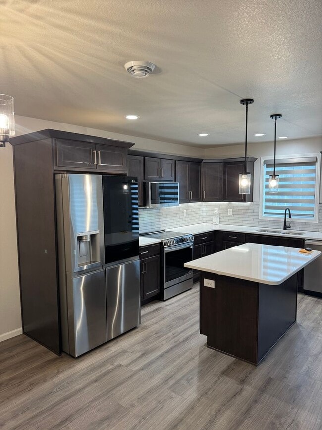 Photo - Modern 3-Bed Twinhome with Garage & Yard –...