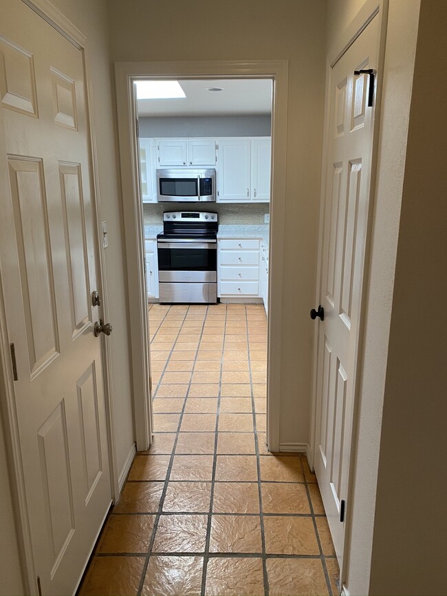 Laundry room view toward kitchen - 4528 Lanham St