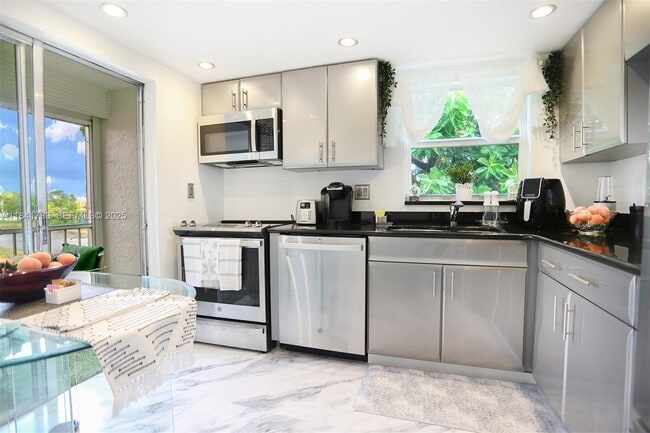 Photo - 6570 Royal Palm Blvd Unit 301J