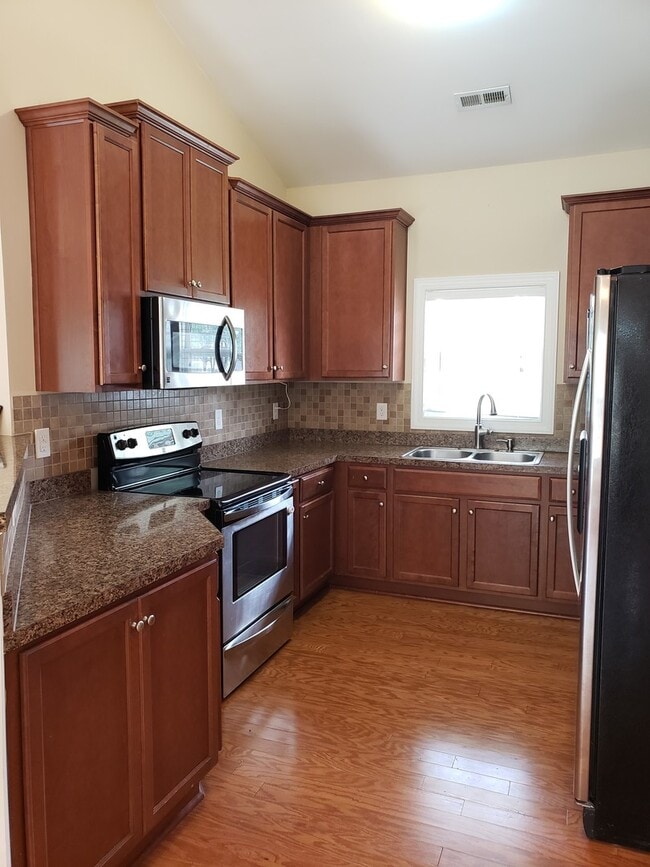 Photo - Dazzling 3 Bedroom Home with Bonus Room, Fenced Backyard! Located in Cooper Farms!