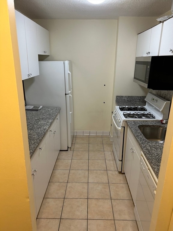 Building Photo - 77 Pond Ave Unit 407