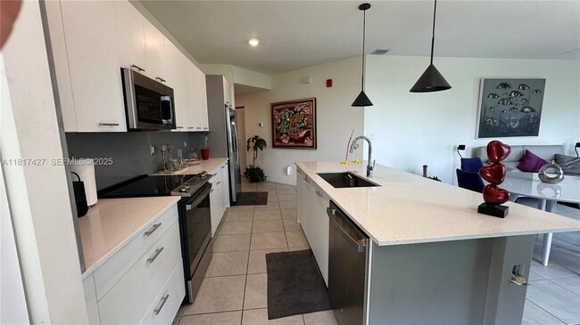 Building Photo - 8001 NW 41st St Unit F-307