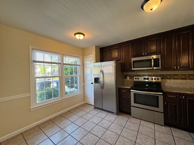 Photo - Introducing a newly renovated town-home "A...