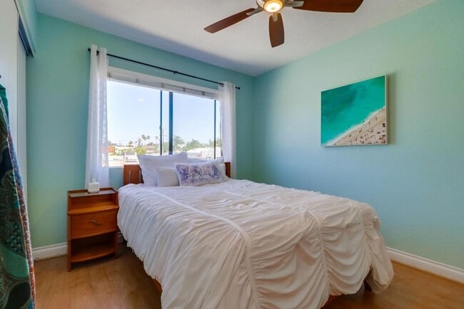 Photo - Stunning 2 bed 2 bath top floor condo in gated community with 2 covered parking spaces!