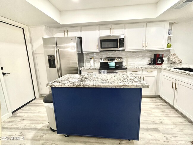 Building Photo - 9040 E Winchcomb Dr Rental