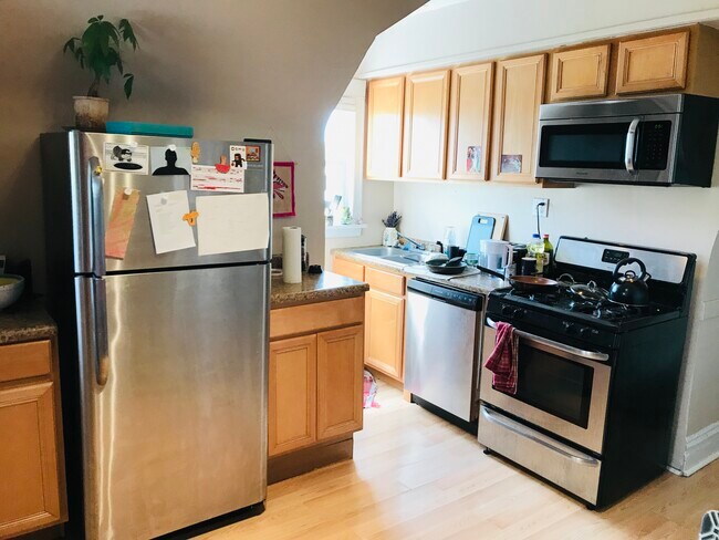 Building Photo - 3434 W Drummond Pl Unit 3