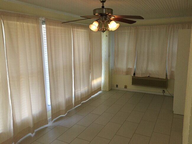 Bedroom Main Floor. Room has personal heater and air conditioner. (Empty)