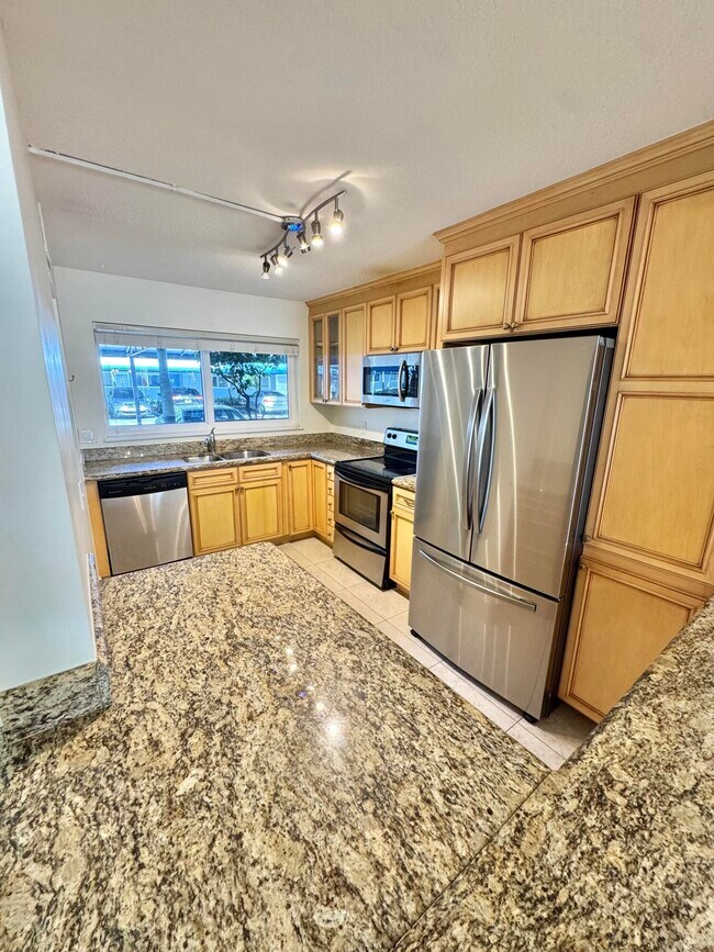 Photo - 651 E Woolbright Rd Unidad 103