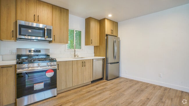 Building Photo - 6112 Saturn St Unit 6112 1/2 Rental