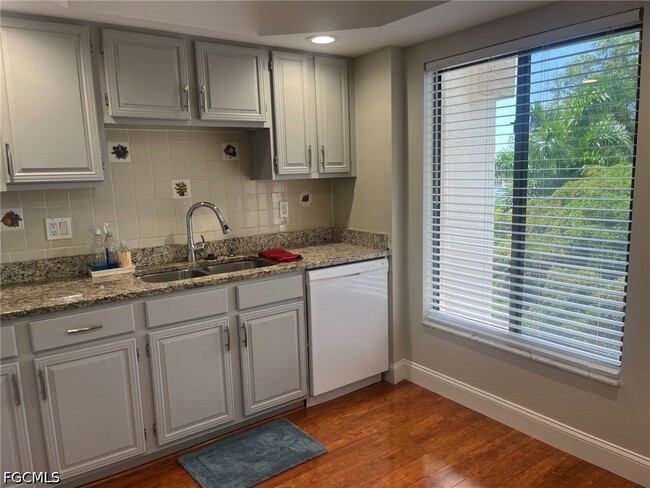 Building Photo - 7430 Lake Breeze Dr Unit 505