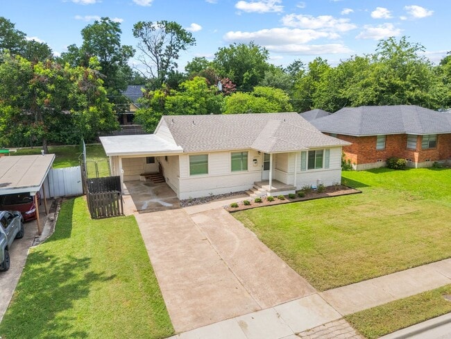 Photo - **$40K+ IN UPGRADES AND A FENCED BACKYARD WITH TWO STORAGE BUILDINGS**