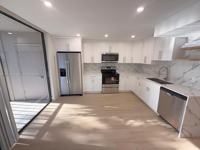 Building Photo - 8420 SW 133rd Avenue Rd Unit 219-2