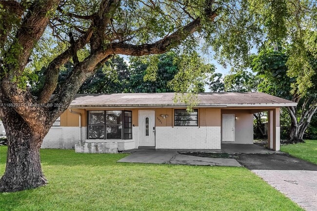 Building Photo - 5801 Royal Palm Blvd Rental