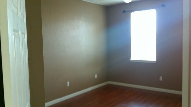 Photo - Beautiful 1/1 corner unit with upgraded wood floors a large balcony with an Orange Avenue view.