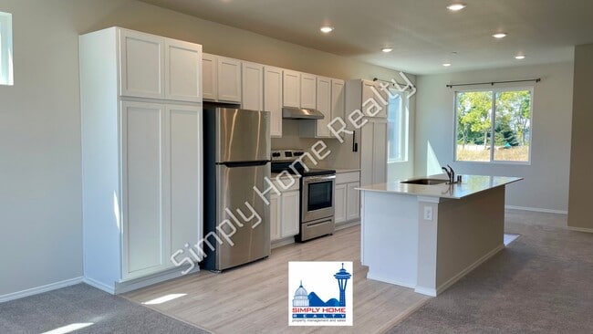 Photo - Step Inside to a Townhome Made for Easy Living!