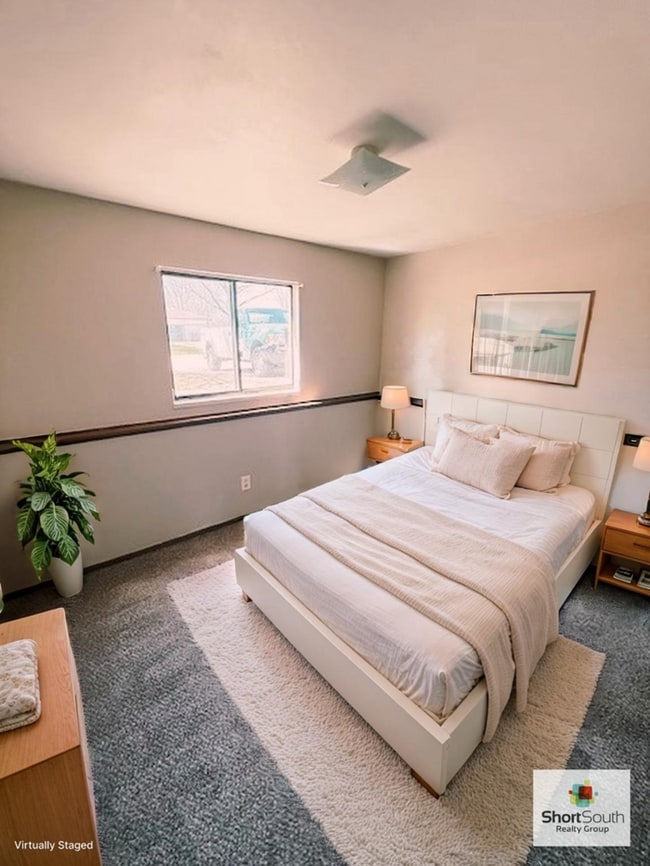 Photo - Updated 2 bed 1 bath main floor apartment with covered detached garage