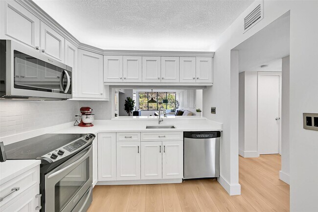 Photo - 2660 Carambola Cir N Condo Unit 202