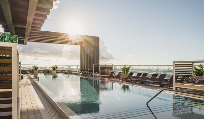 Take a dip in your resort-style rooftop pool - The Watermarc at Biscayne Bay Apartments