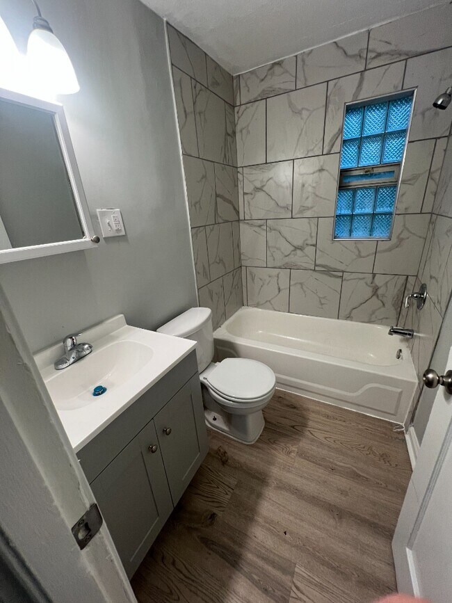 Photo - Spacious, Newly Updated 1-Bed Near UC & Downtown — Off-Street Parking, Radiant Heat Unit 3