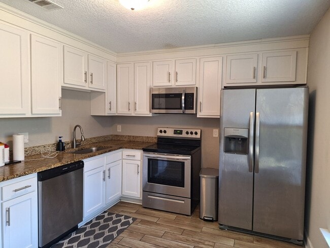 Photo - 3459 Excalibur Way E Unit 3459 EXCALIBUR Way E TP