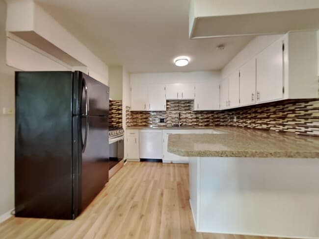 Photo - Charming 3-Bedroom Home with Sunroom, Fireplace & Garage in Kansas City, MO!