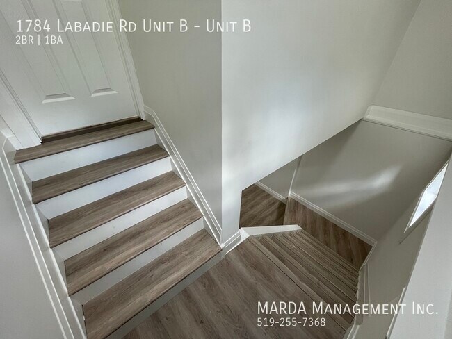 Photo - SPACIOUS & BRIGHT 2 BED/1 BATH LOWER UNIT + 40% UTILITIES Unité B