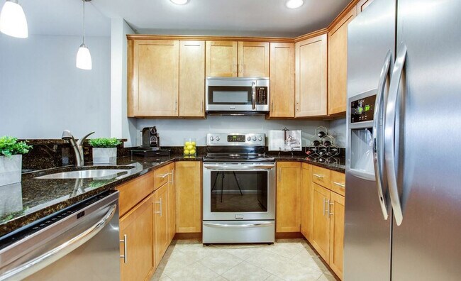 Kitchen with Granite Countertops, Stainless Steel Appliances, and Soft Closing Cabinetry - 2681 Glengyle Dr
