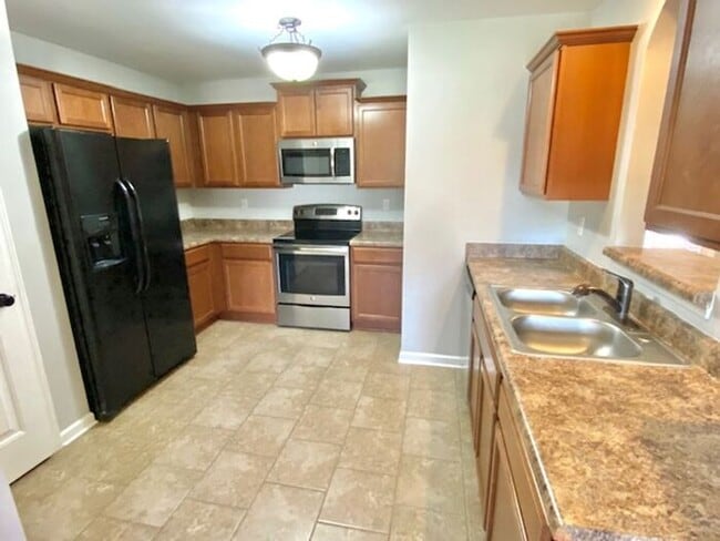 Photo - Now Leasing a 4-bedroom 2 bath home on Olive Branch