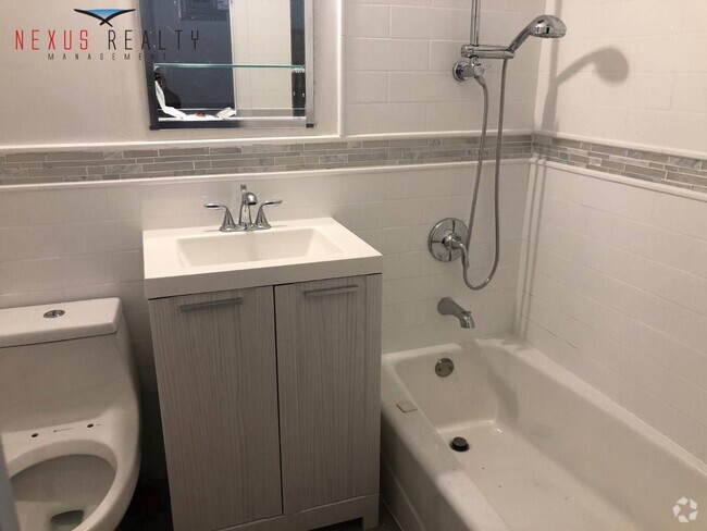 Building Photo - 19-46-46 75th St Rental