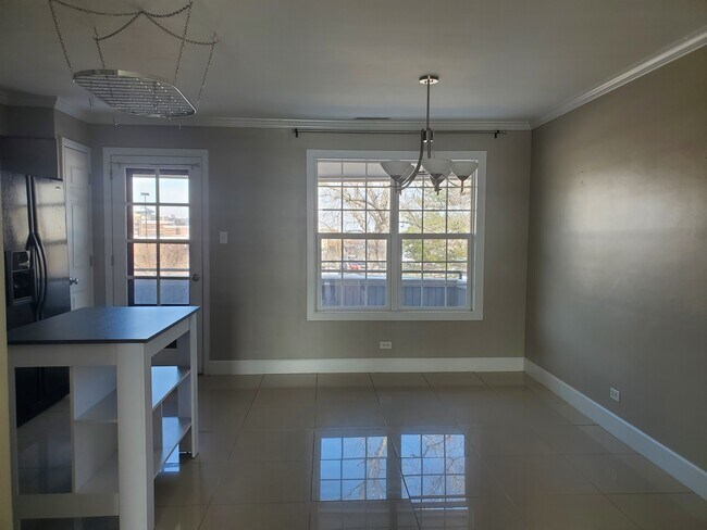 Building Photo - 7110 S Gaylord St Unit K10