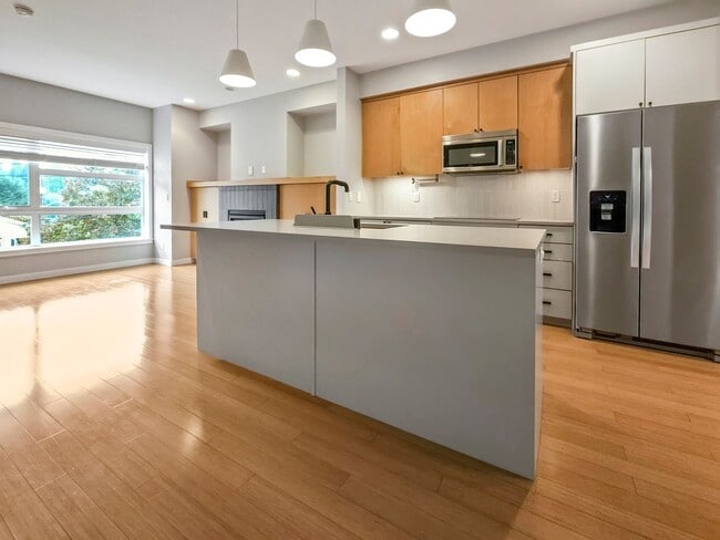 Photo - 3-Story Townhouse | 3 Bed, 3.5 Bath | Central Heating | Hardwood Floors | Carpeted Bedrooms | Off...