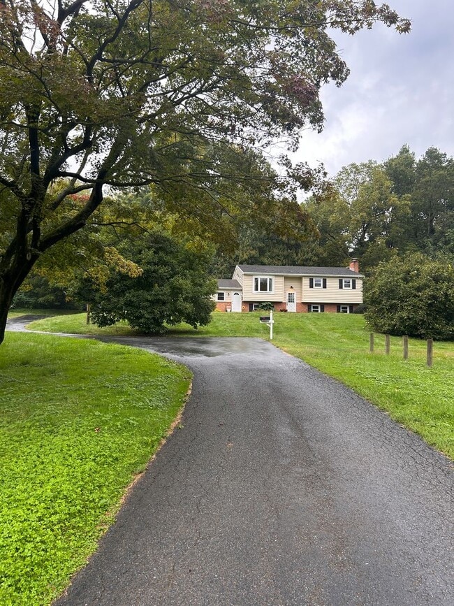 Photo - Spacious 4-Bedroom Home with Large Yard & Garage!