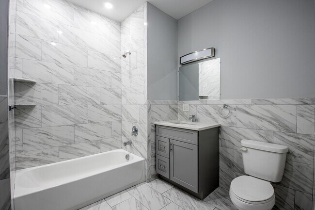 Huge Marble Bathrooms - The Clinton Grand North