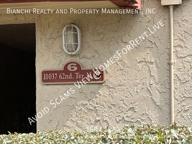 Building Photo - 10037 62nd Ter Unit #15