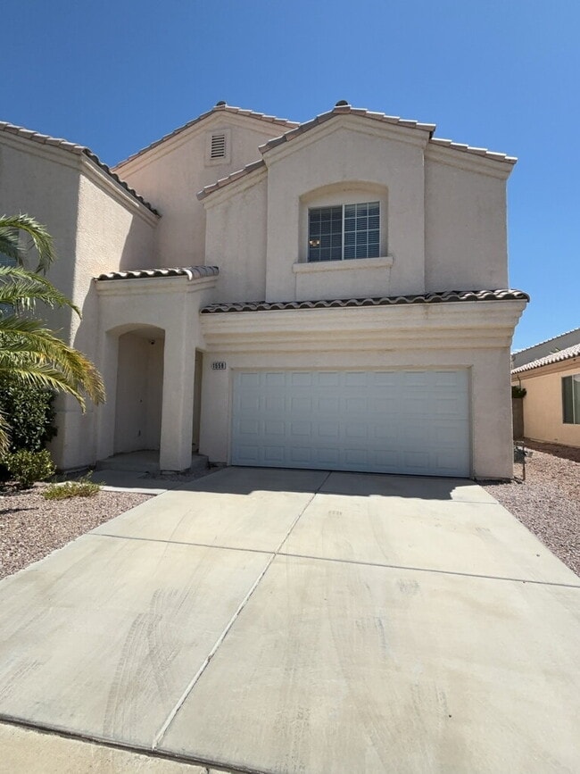 Building Photo - This beautiful two-story home is located in a gated community.