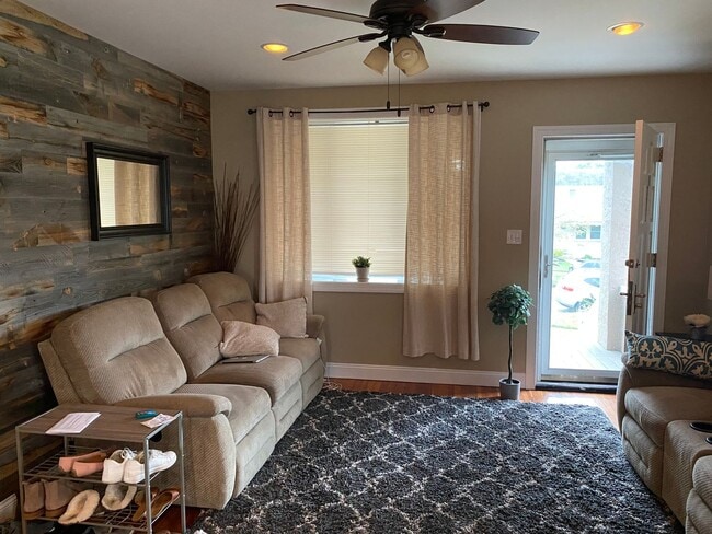 Building Photo - 3BR Twin Home | Hardwood Floors • Fenced Yard • Garage • W/D Included