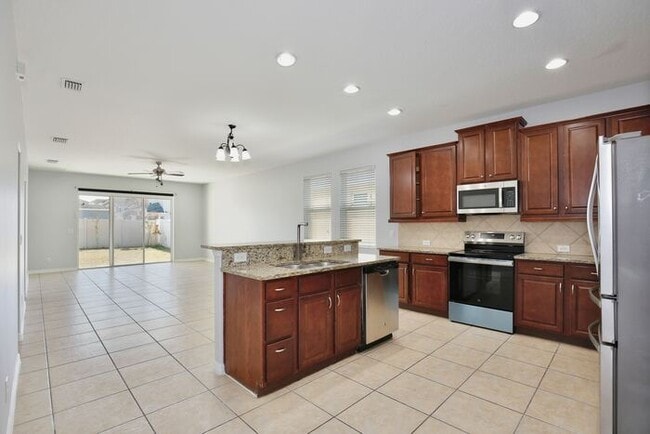 Photo - Stylish, Updated 3/2 Home in One of Millennia Park’s Gated Communities! Available Now!