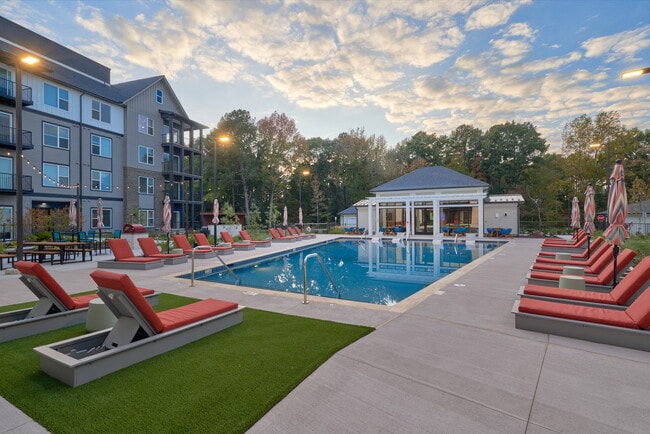 Resort-style Swimming Pool with Tanning Ledge and Sundeck - Bexley West Creek
