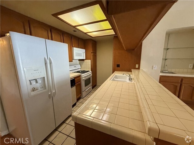 Building Photo - 11630 Warner Ave Unit 508 Rental