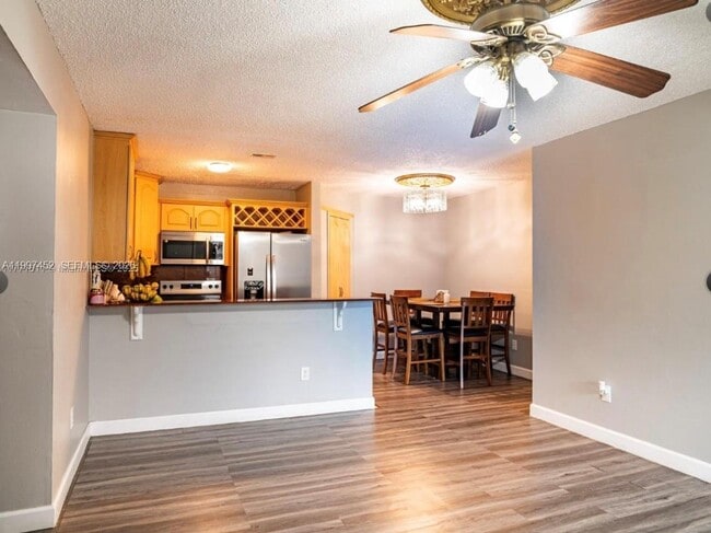 Building Photo - 6545 W 27th Ct Unit 24-47