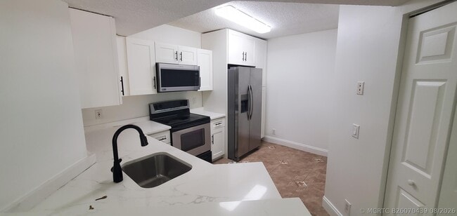 Photo - 8721 Wiles Rd Unit 302