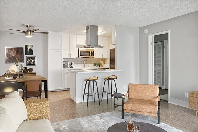 Renovated kitchen with upgraded stainless steel appliances.