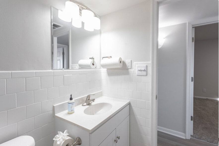 Top to Bottom Remodeled Bathrooms in a Clean Aesthetic