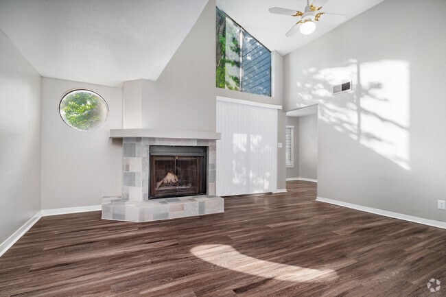 1BR, 1BA -756SF - Vaulted Ceiling Living Room