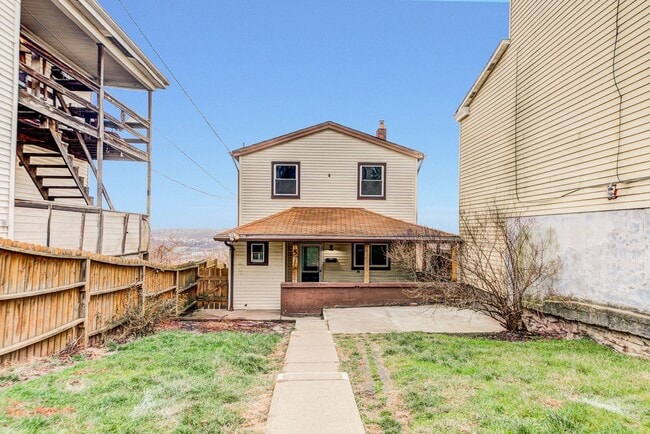 Building Photo - AVAILABLE JUNE 2026 -  4 Bedroom Full Renovation w/ Stunning Hilltop View & Central AC!