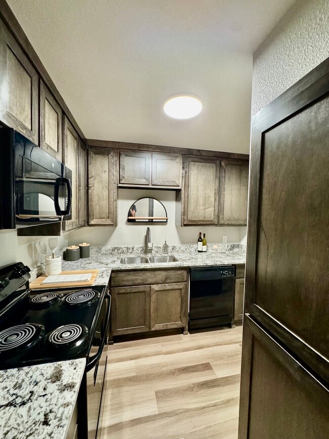 Two Bedroom, Two Bathroom L-Shape Kitchen - Midtown Apartments