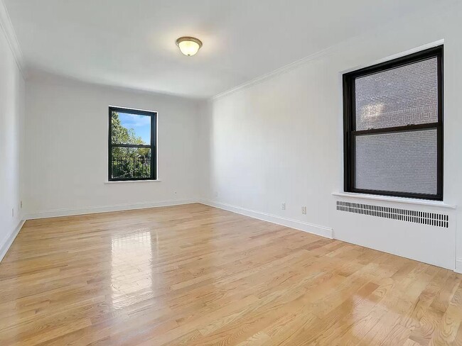 Building Photo - 76-66 Austin St Unit 2L