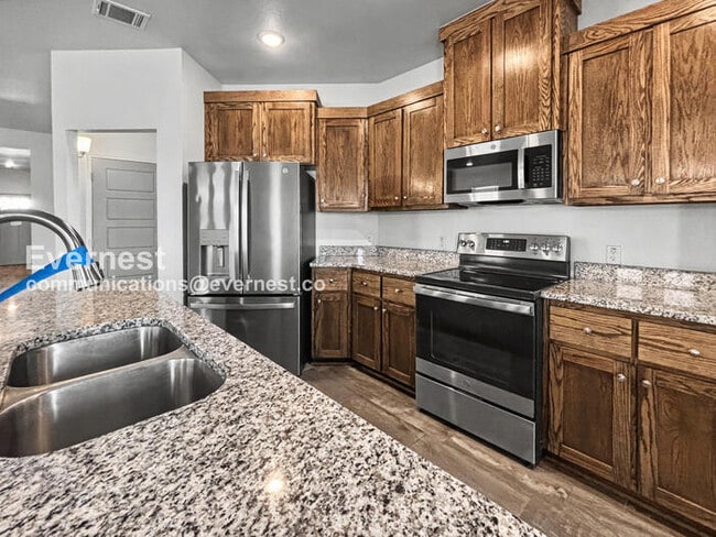 Photo - Limited Time Special Offer / 4 Bed, 3 Bath Home with Garage / Pet-Friendly / Vouchers Accepted / ...