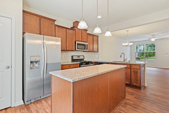 Photo - 2 Bedroom, 2.5 Bath townhome in Thompson Ridge with new LVP flooring downstairs.
